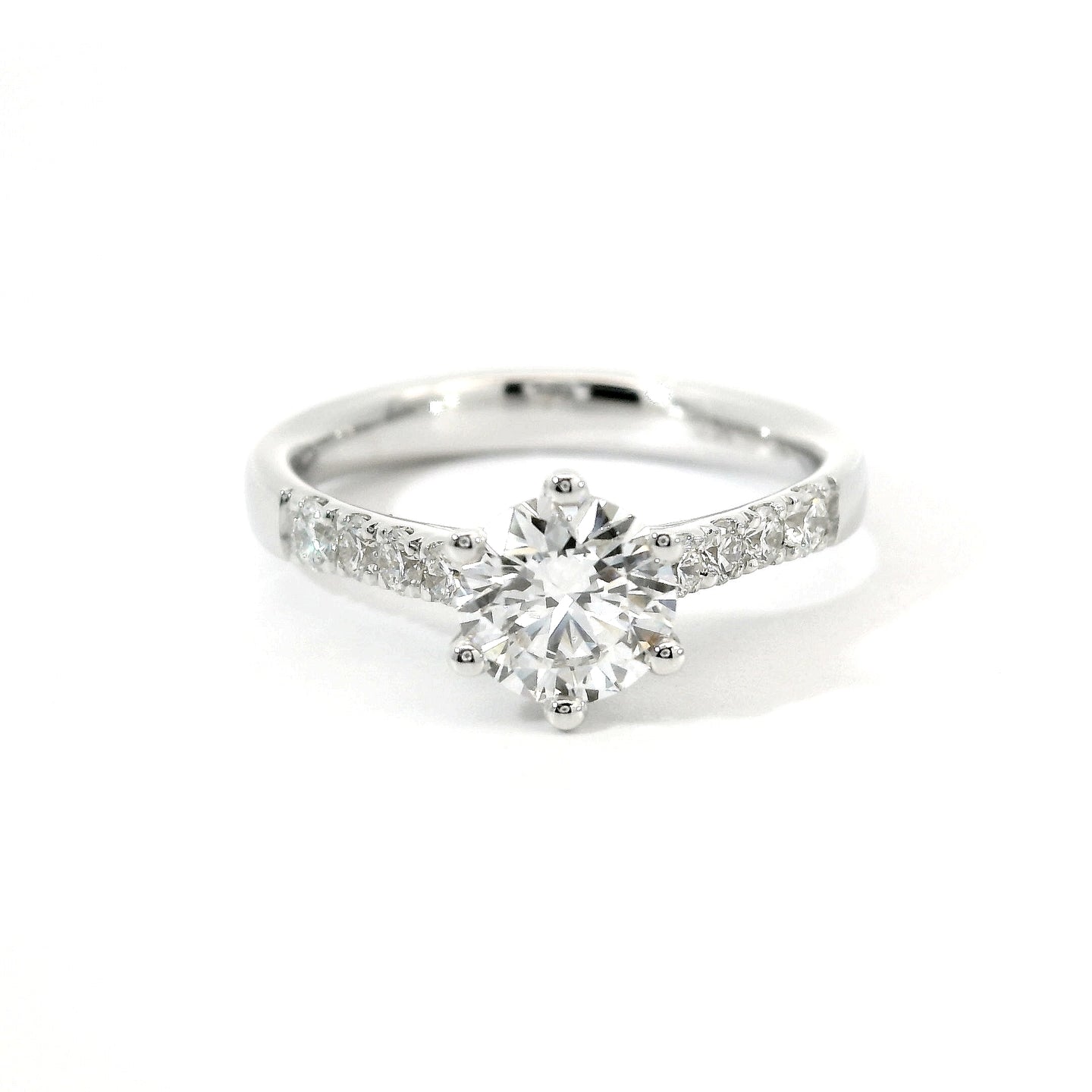 White gold solitaire with brilliant-cut lab-grown diamonds on the shank, 1.08 carats.