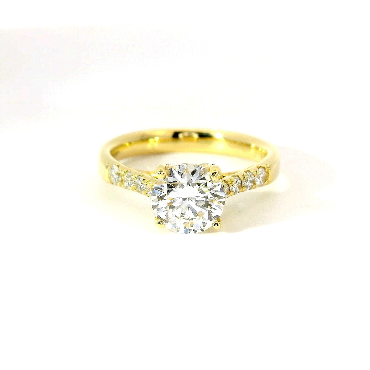 White gold solitaire with brilliant-cut diamonds on the shank, 1.08 carats.