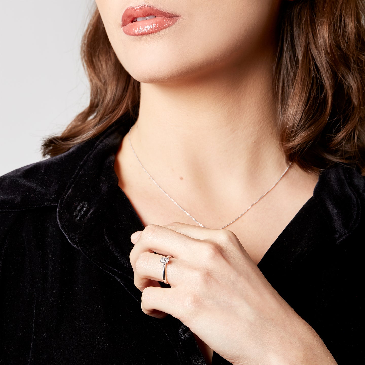 White gold solitaire with oval-cut lab-grown diamond, 0.50 carats.