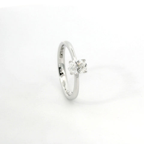 White gold solitaire with oval-cut lab-grown diamond, 0.50 carats.