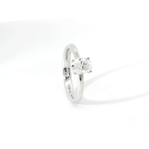 White gold solitaire with oval-cut lab-grown diamond, 0.71 carats.