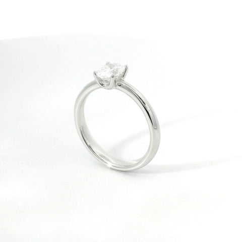 White gold solitaire with oval-cut lab-grown diamond, 0.71 carats.