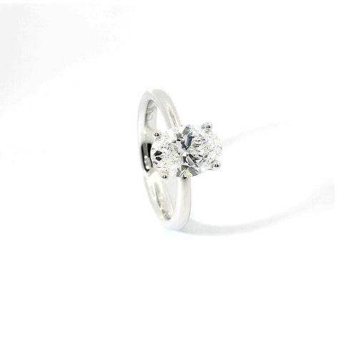 Solitaire in white gold with oval-cut lab-grown diamond, 1.54 carats.