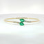 Bracciale Twin in oro giallo con smeraldi Lab-Grown taglio goccia e diamanti Lab-Grown taglio brillante.