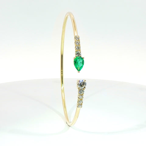 Bracciale Twin in oro giallo con smeraldo Lab-Grown taglio ovale e diamanti Lab-Grown taglio brillante.