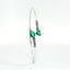 Bracciale Twin in oro bianco con smeraldi Lab-Grown e diamanti Lab-Grown taglio brillante.