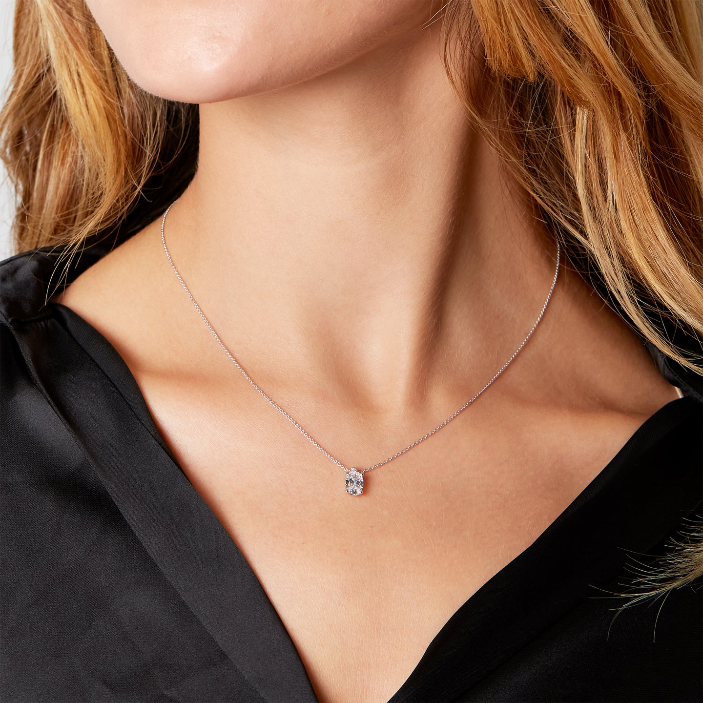White gold light point choker with oval-cut lab-grown diamond, 0.92 carats.