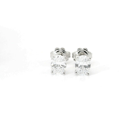 White gold stud earrings with oval-cut lab-grown diamond, 1.41 carats.