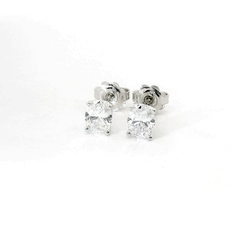 White gold stud earrings with oval-cut lab-grown diamond, 1.41 carats.
