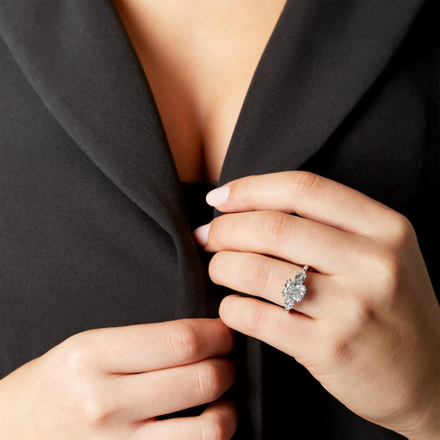 Trilogy with cushion cut lab-grown diamond and two pear cut lab-grown diamonds, 3.90 carats.