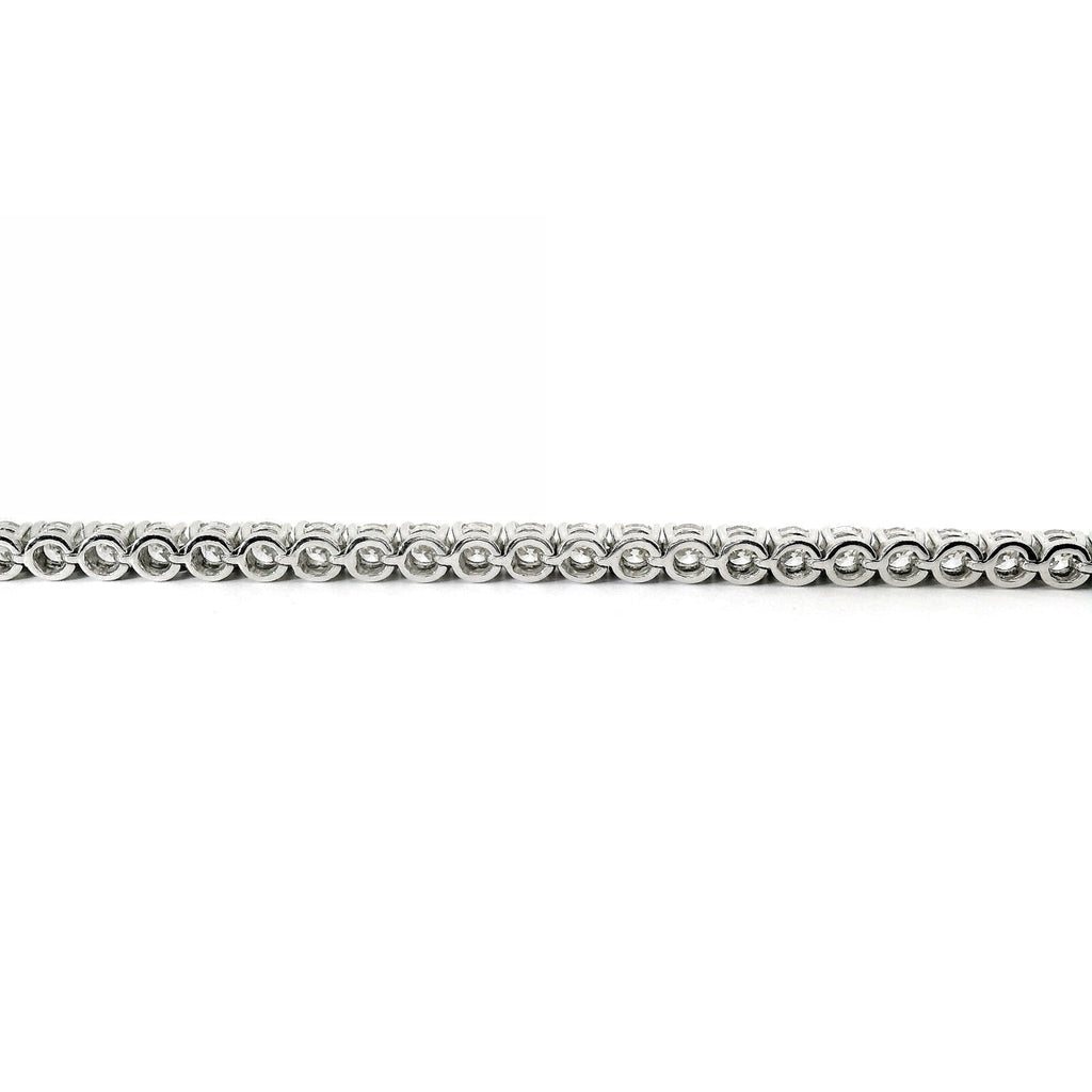 White gold wire tennis bracelet with brilliant-cut lab-grown diamonds, 5.54 carats.