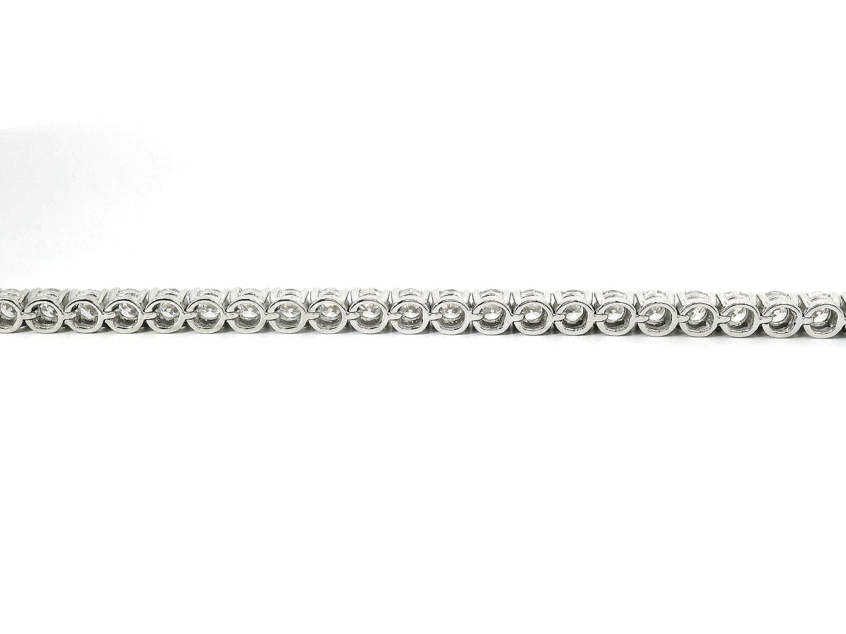White gold wire tennis bracelet with brilliant-cut lab-grown diamonds, 5.54 carats.
