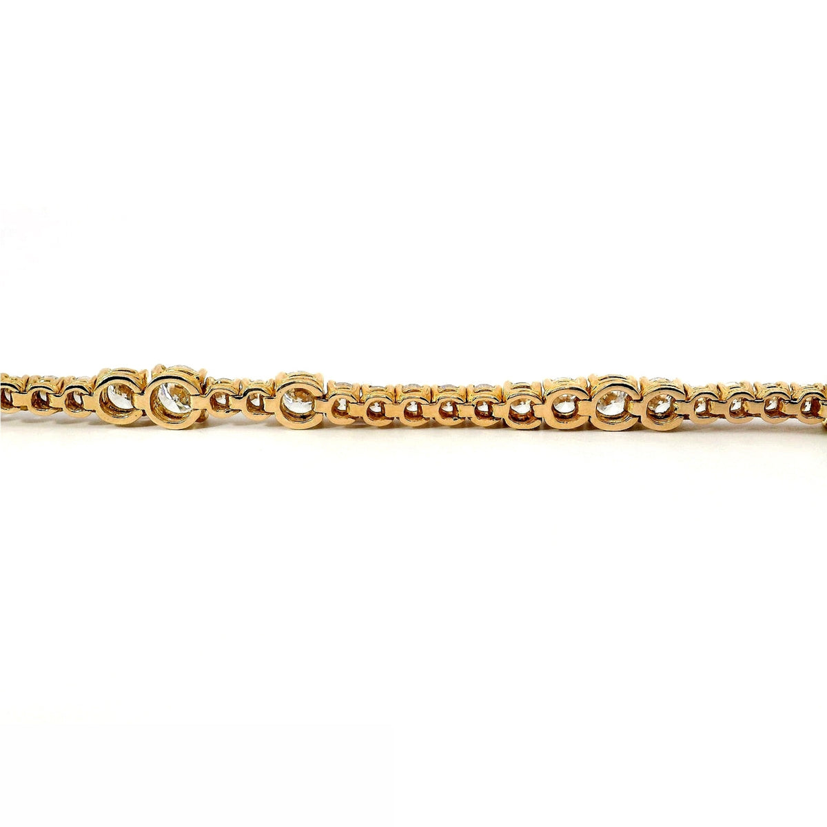 Bracciale Tennis con spot a filo in oro rosa con diamanti lab-grown taglio brillante, 5,85 carati.
