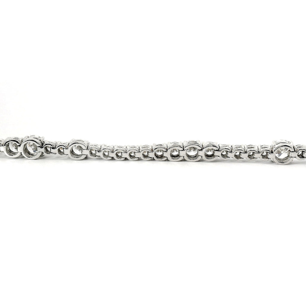 White gold wire spot tennis bracelet with brilliant-cut lab-grown diamonds, 6.06 carats.