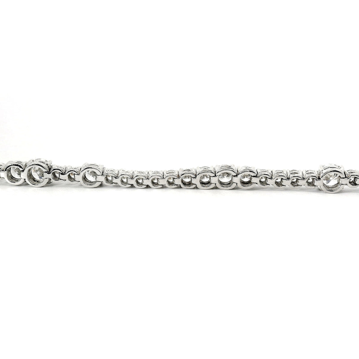 White gold wire spot tennis bracelet with brilliant-cut lab-grown diamonds, 6.06 carats.