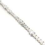 White gold wire spot tennis bracelet with brilliant-cut lab-grown diamonds, 6.06 carats.