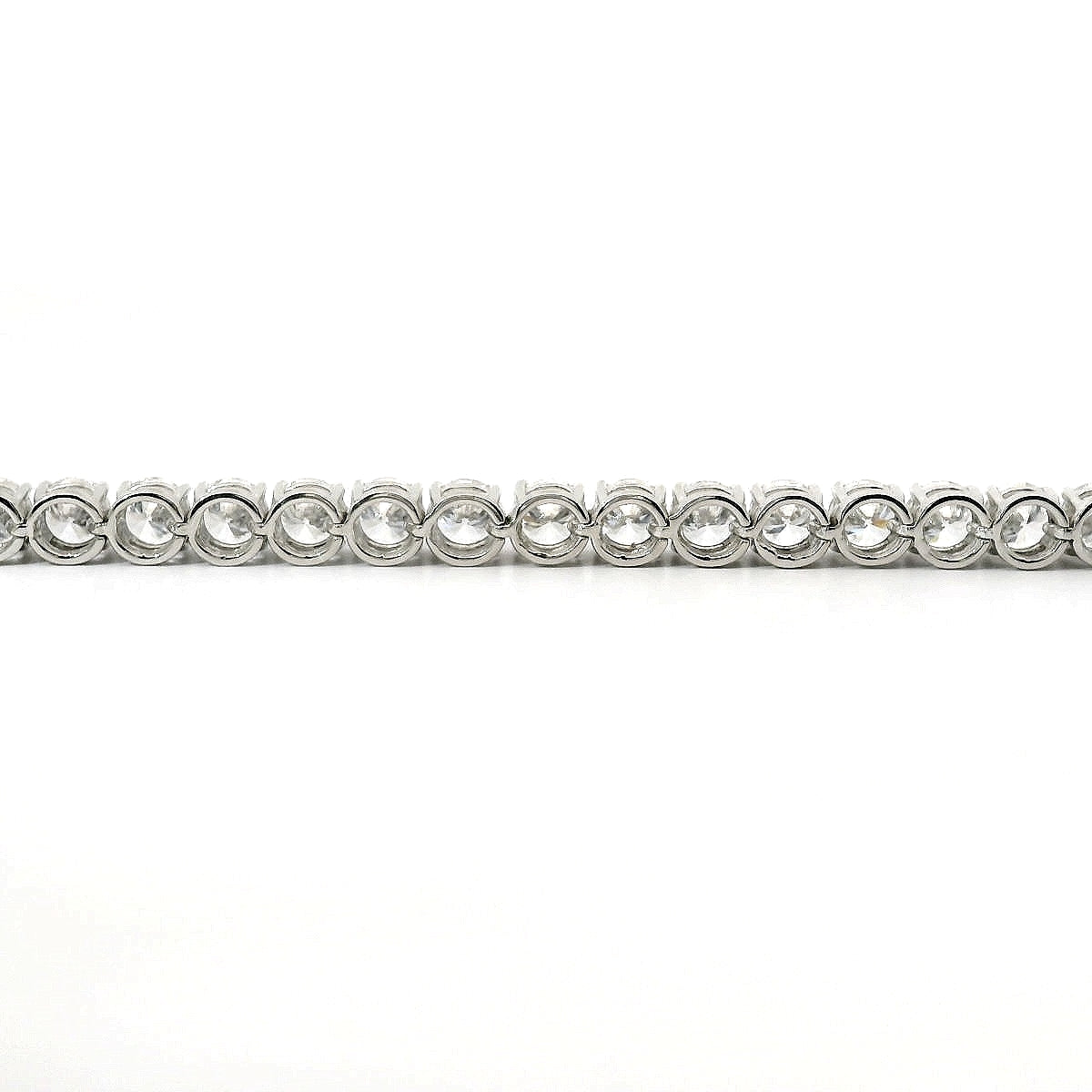 Bracciale tennis a filo in oro bianco e diamanti lab-grown taglio brillante, 11,84 carati.