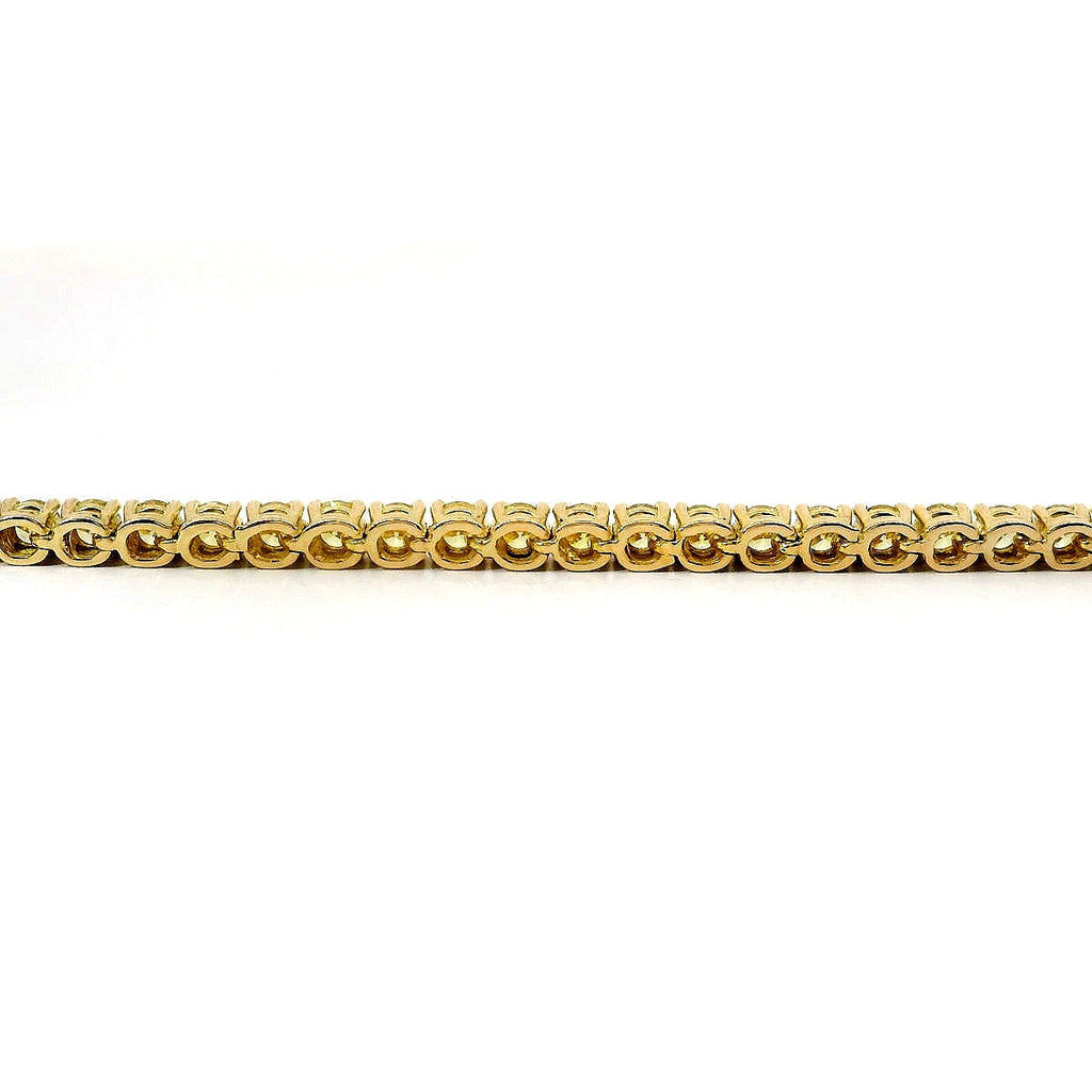 Bracciale tennis a filo in oro giallo e diamanti lab-grown taglio brillante, 3,58 carati.