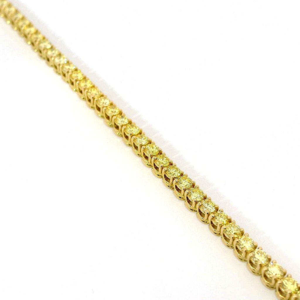 Bracciale tennis a filo in oro giallo e diamanti lab-grown taglio brillante, 3,58 carati.