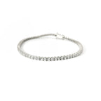 White gold wire tennis bracelet with brilliant-cut lab-grown diamonds, 5.54 carats.