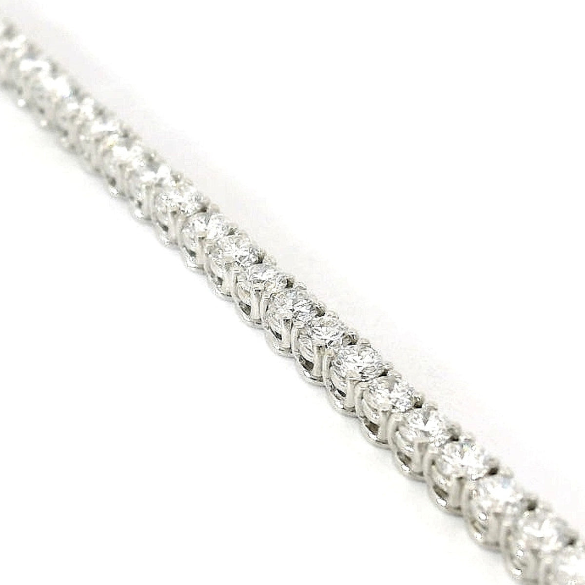 White gold wire tennis bracelet with brilliant-cut lab-grown diamonds, 5.54 carats.