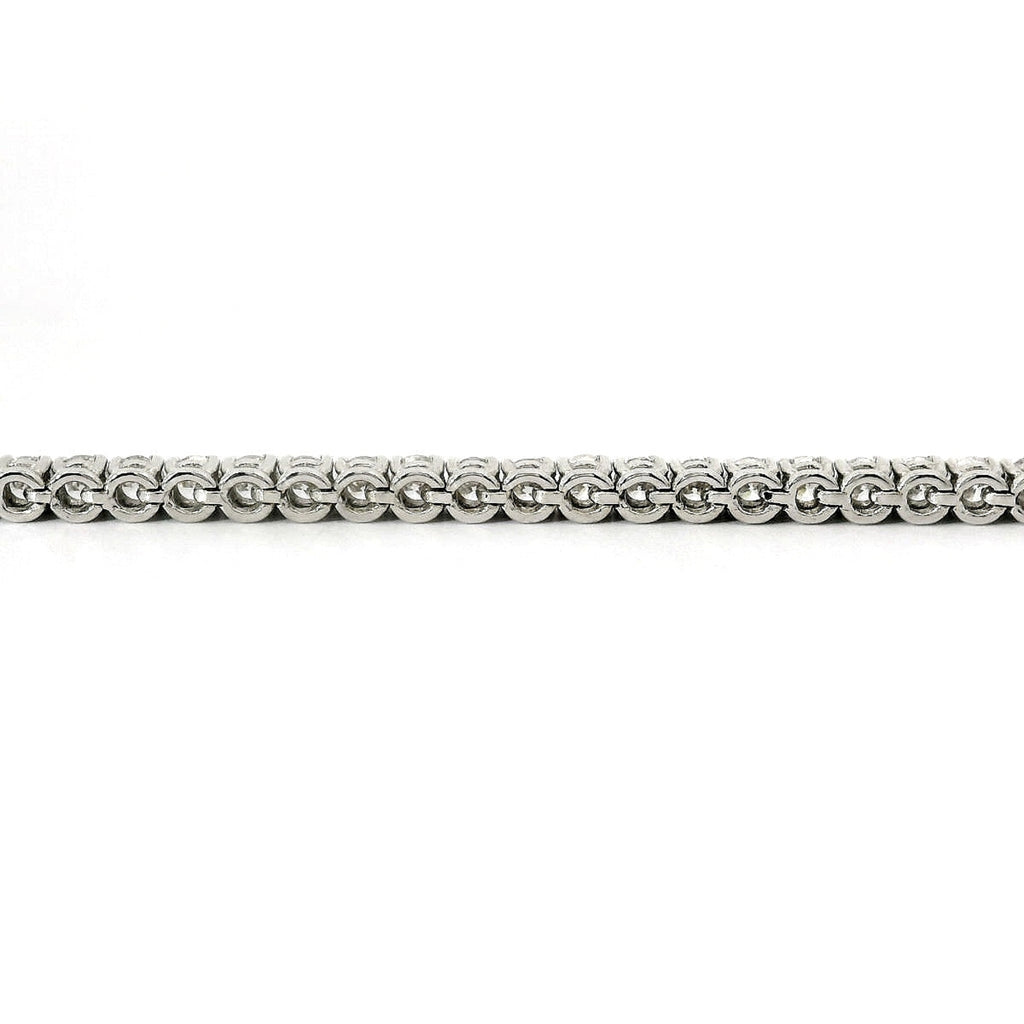 White gold wire tennis bracelet with brilliant-cut lab-grown diamonds, 5.54 carats.