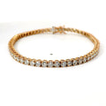 Bracciale tennis a filo in oro rosa e diamanti lab-grown taglio brillante, 4,50 carati.