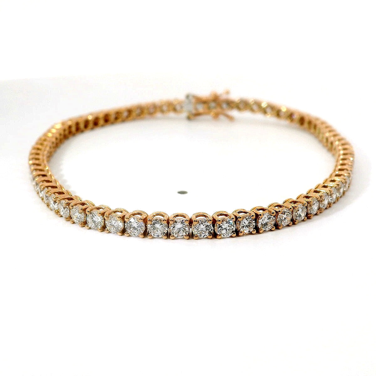 Bracciale tennis a filo in oro rosa e diamanti lab-grown taglio brillante, 4,50 carati.