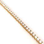 Bracciale tennis a filo in oro rosa e diamanti lab-grown taglio brillante, 4,50 carati.