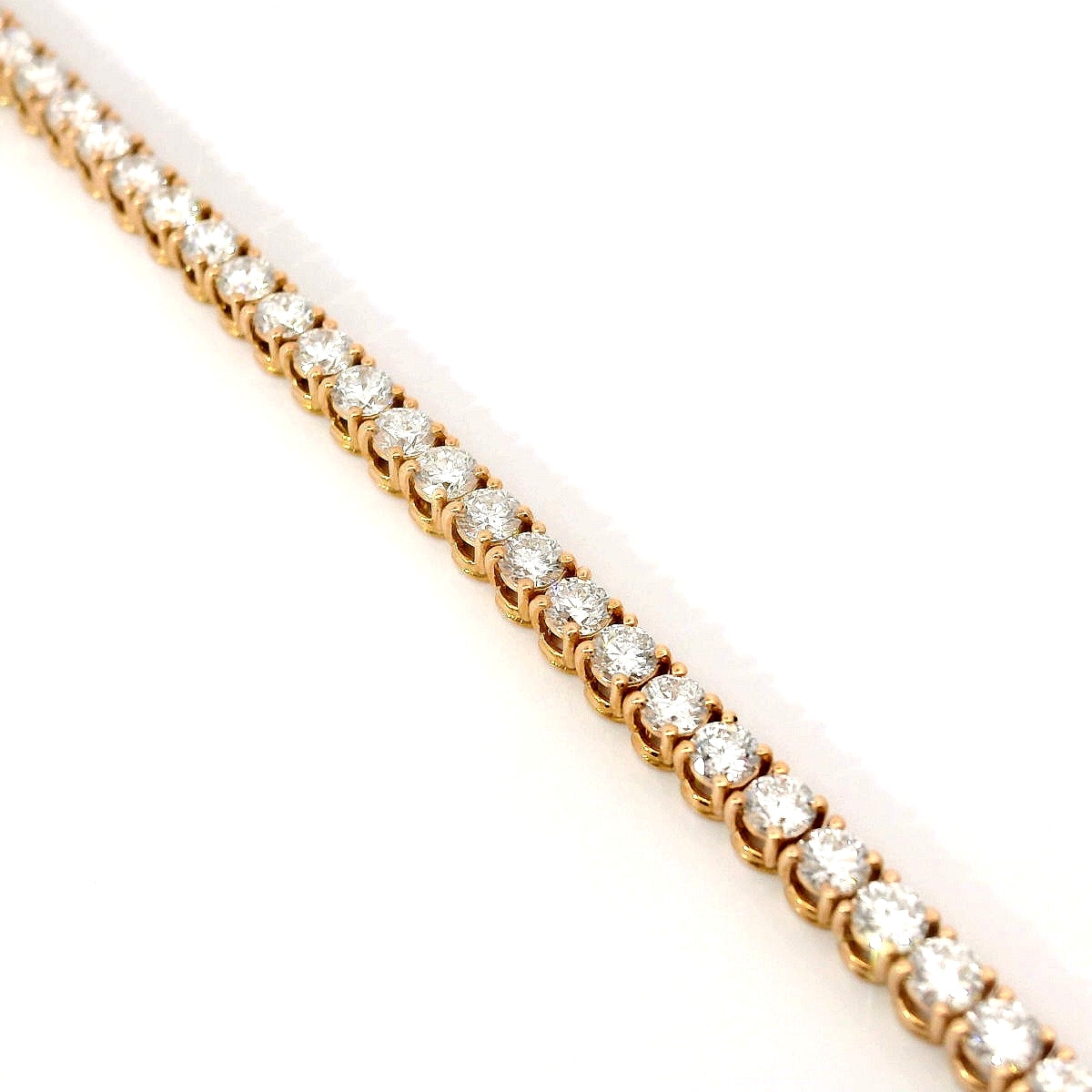 Bracciale tennis a filo in oro rosa e diamanti lab-grown taglio brillante, 4,50 carati.