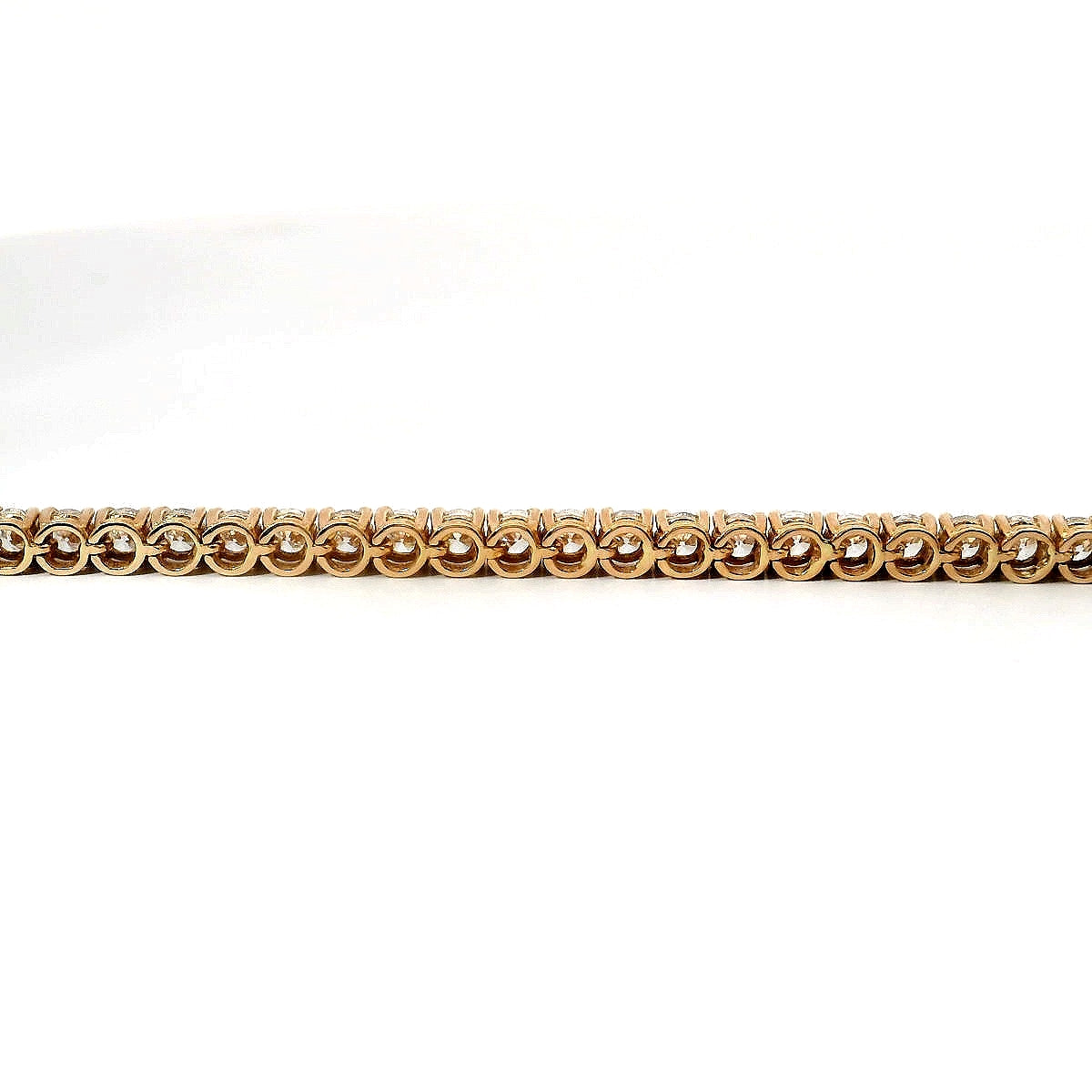 Bracciale tennis a filo in oro rosa e diamanti lab-grown taglio brillante, 4,50 carati.