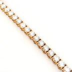 Bracciale tennis a filo in oro rosa e diamanti Lab-grown taglio brillante, 7,54 carati.