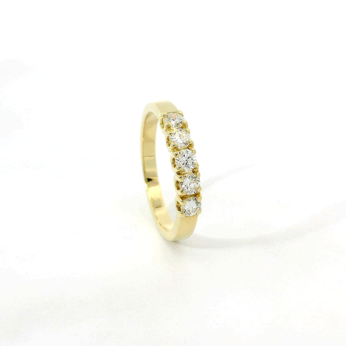 White gold band with 5 brilliant-cut lab-grown diamonds, 2.10 carats.