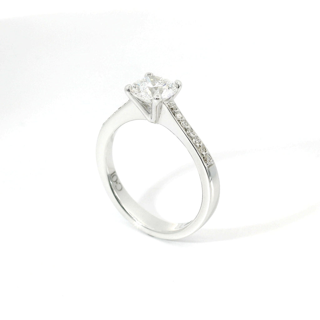 White gold solitaire with brilliant-cut diamonds on the shank, 1.08 carats.