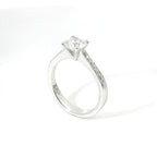 White gold solitaire with brilliant-cut diamonds on the shank, 1.08 carats.
