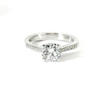 White gold solitaire with brilliant-cut diamonds on the shank, 1.08 carats.
