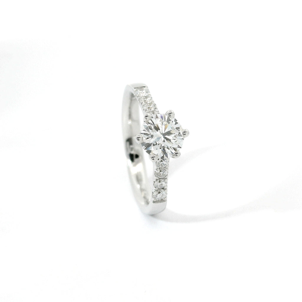 White gold solitaire with brilliant-cut lab-grown diamonds on the shank, 1.08 carats.
