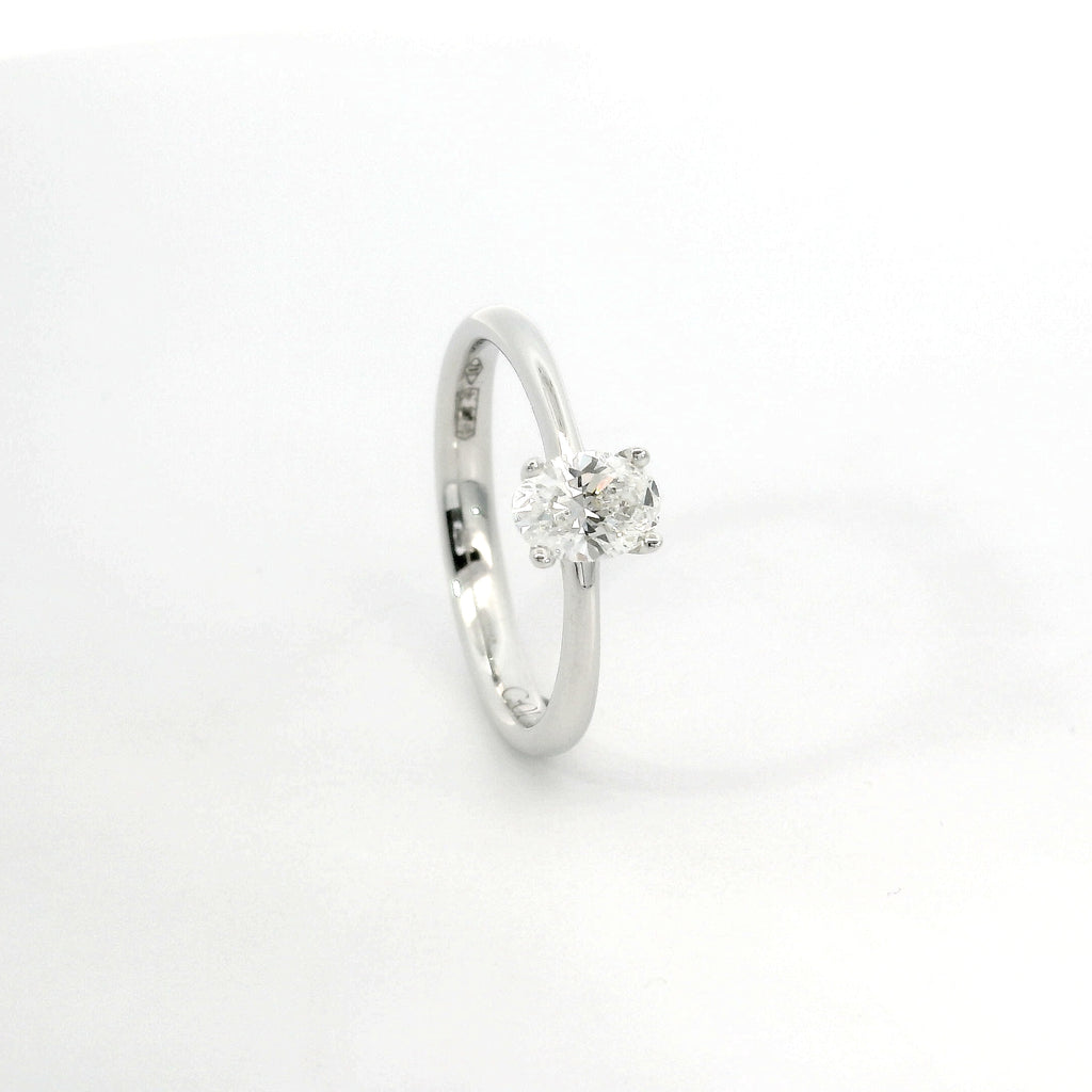 Solitaire in white gold with oval-cut lab-grown diamond, 1.54 carats.