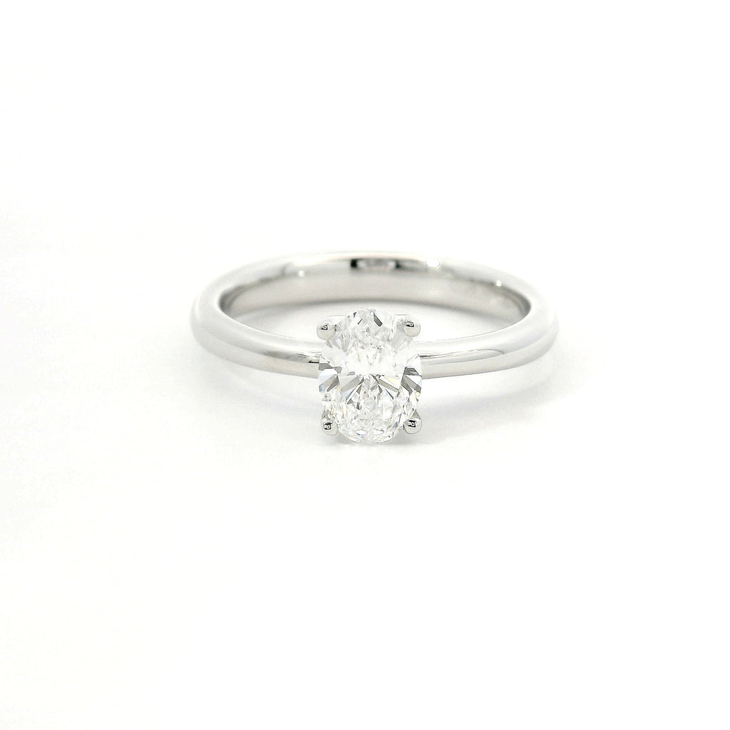 Solitaire in white gold with oval-cut lab-grown diamond, 1.54 carats.