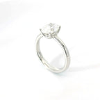 Solitaire in white gold with oval-cut lab-grown diamond, 1.54 carats.