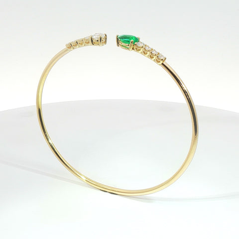 Bracciale Twin in oro giallo con smeraldo Lab-Grown taglio ovale e diamanti Lab-Grown taglio brillante.