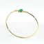 Bracciale Twin in oro giallo con smeraldi Lab-Grown e diamanti Lab-Grown taglio brillante.