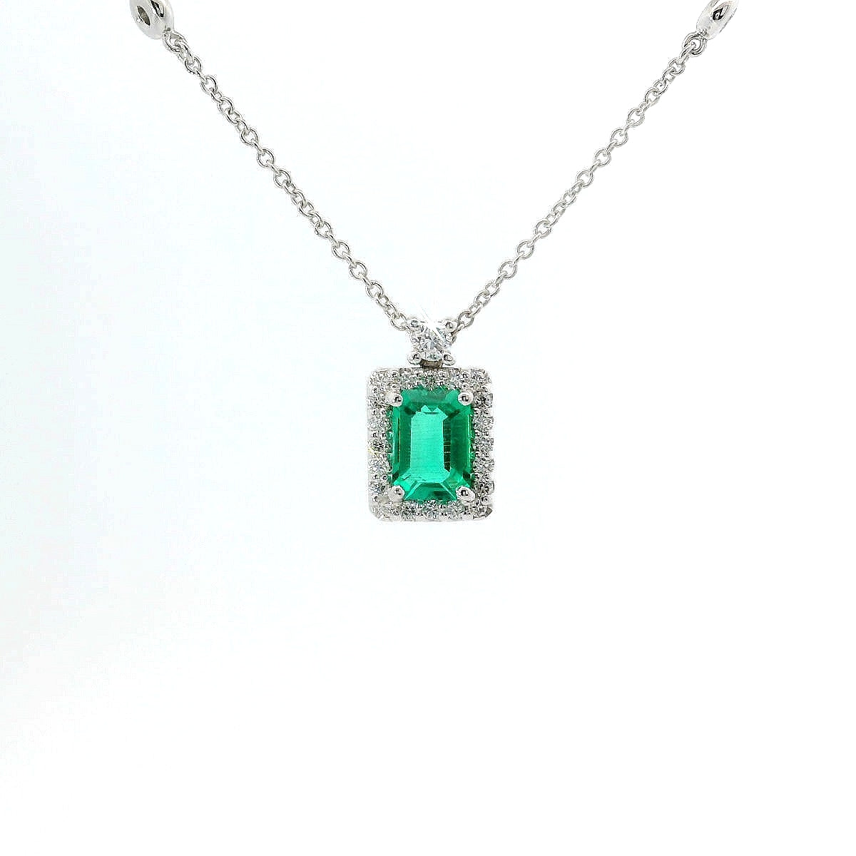 Girocollo in oro bianco con smeraldo Lab-Grown e diamanti Lab-Grown taglio brillante.