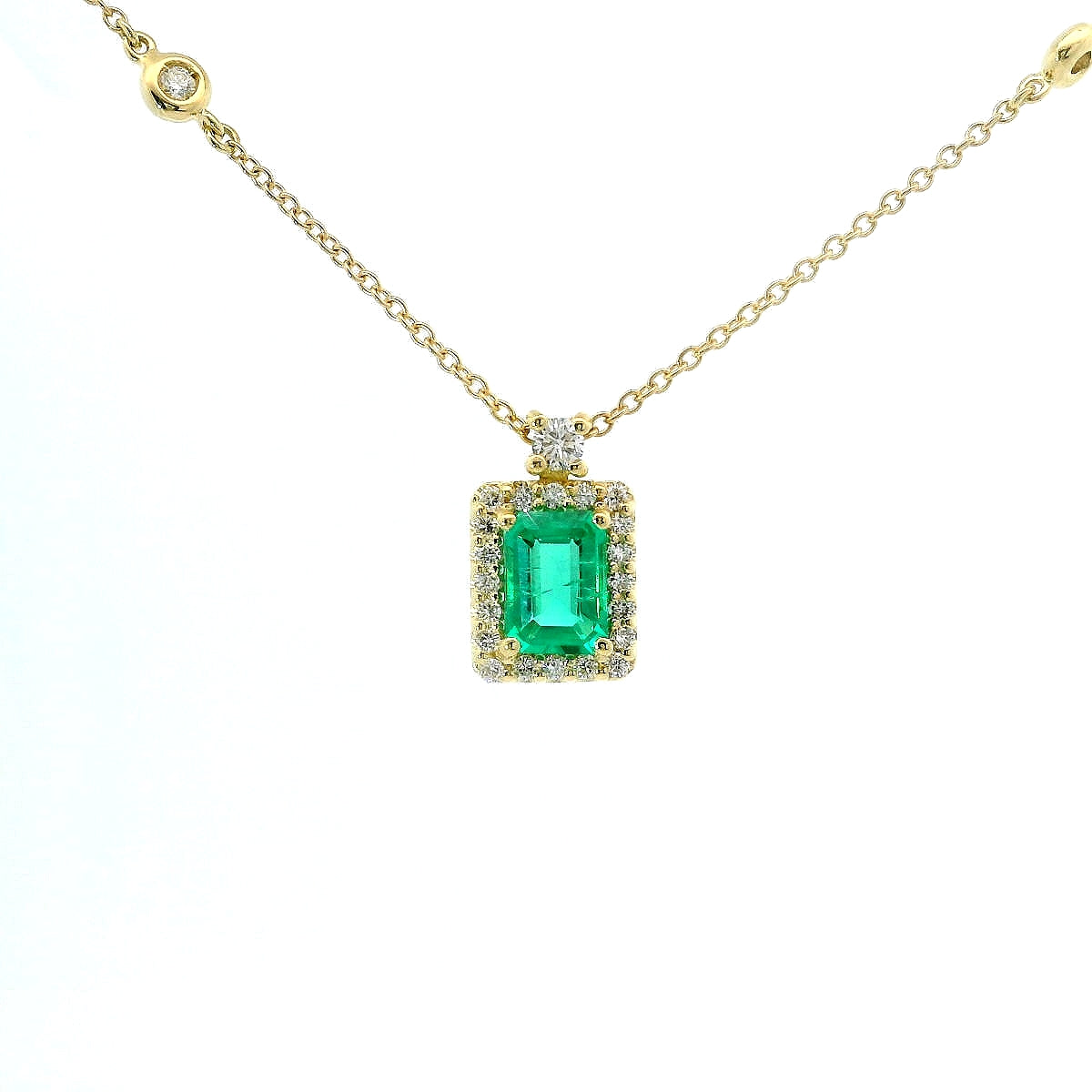Girocollo in oro giallo con smeraldo Lab-Grown e diamanti Lab-Grown taglio brillante.