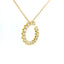 Girocollo con pendente in oro giallo e spot di diamanti Lab-grown taglio brillante, 0,59 carati.