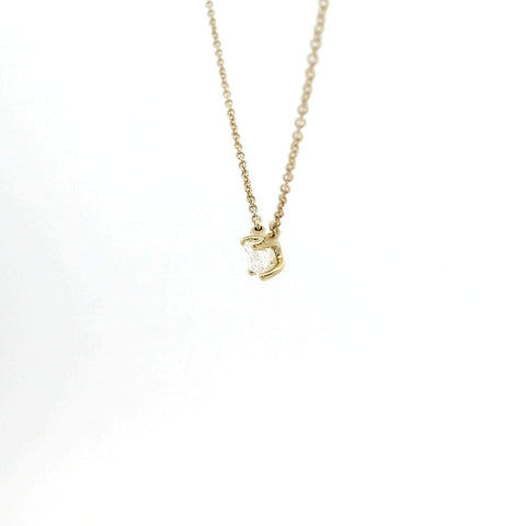 Girocollo punto luce in oro giallo con diamante lab-grown taglio smeraldo, 0,30 carati.