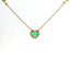 Girocollo in oro giallo con Smeraldo Lab-Grown taglio cuore e diamanti Lab-Grown taglio brillante.