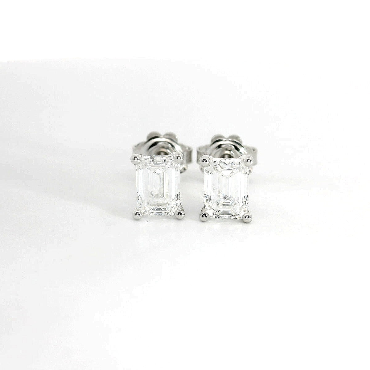 White gold stud earrings with emerald-cut lab-grown diamond, 2.07 carats.