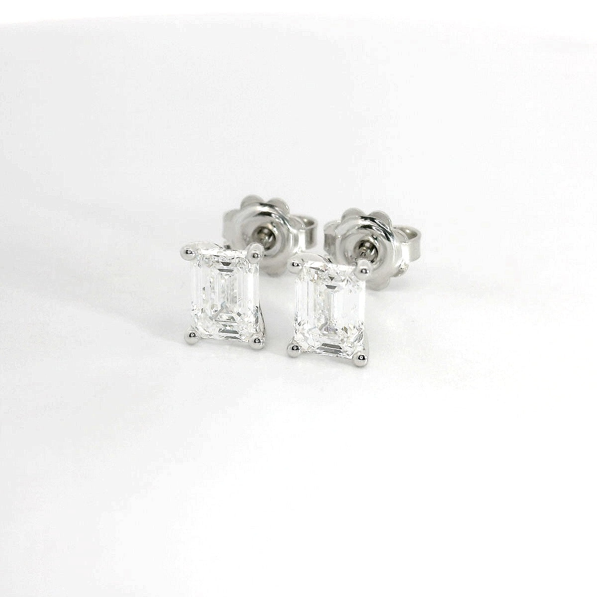 White gold stud earrings with emerald-cut lab-grown diamond, 2.07 carats.