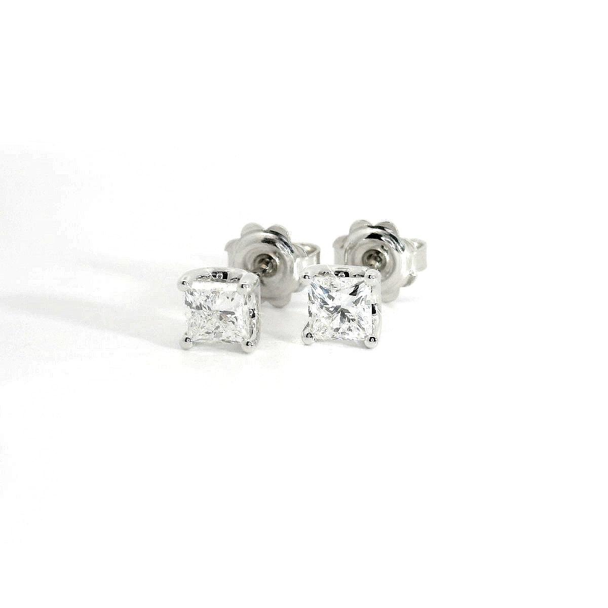 White gold stud earrings with emerald-cut lab-grown diamond, 2.07 carats.
